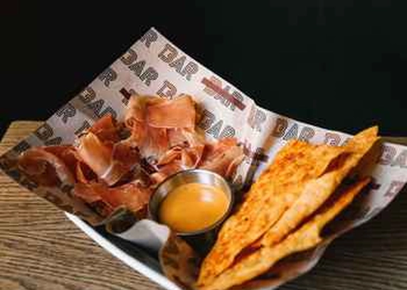 Прошуто з чіпсами начос від Пасаж Адлєра 