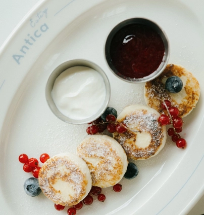 Сирники з малиновим джемом - ANTICA Eatery 